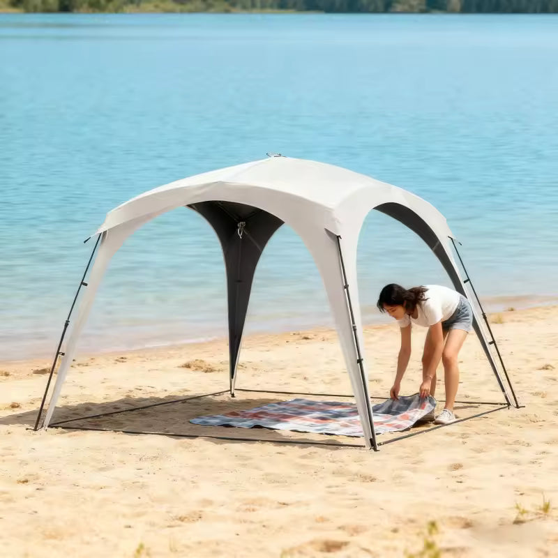 Den Premium Canopy — woman setting up on sandy beach lakeside